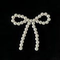 White pearl bow